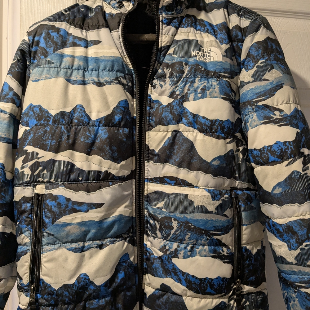 The North Face Boys s Blue and Black Puffer Jacket